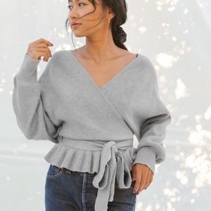 Grey surplice ruffle tie sweater